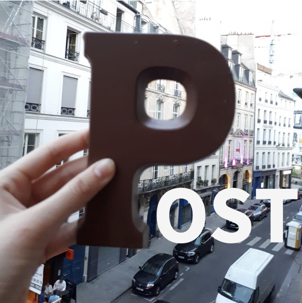 A photograph of P in a city